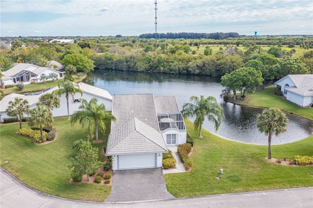 birds eye view of property featuring a water view