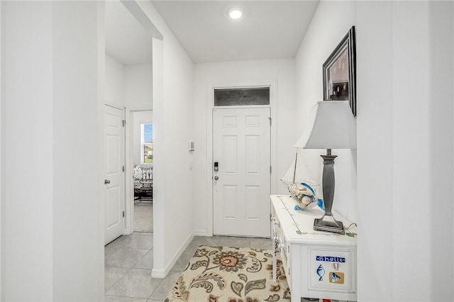 foyer with light tile patterned floors