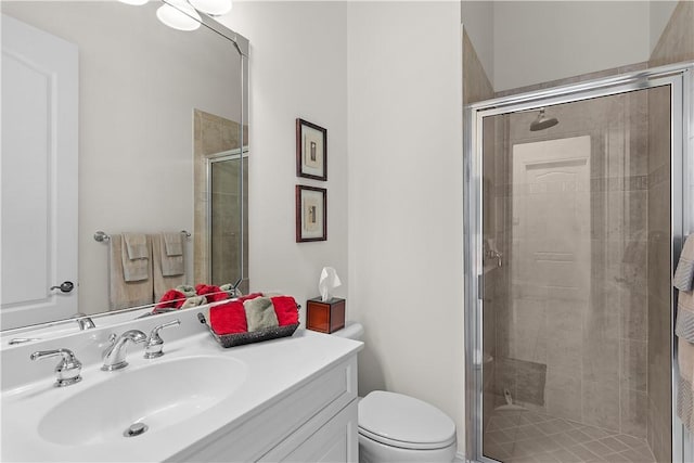 1274 River Reach Dr, Vero Beach, FL 32967 - bathroom with toilet, a shower stall, and vanity