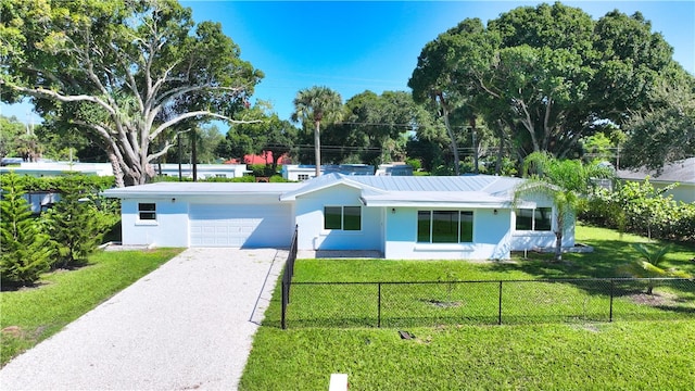 ranch-style house with a front lawn and a garage