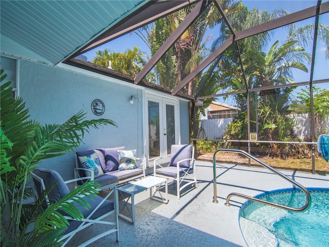 view of pool featuring fence, french doors, an outdoor hangout area, a fenced in pool, and a patio area