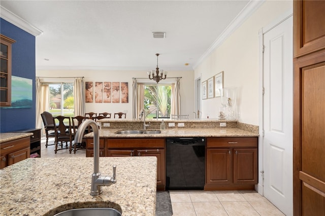 kitchen featuring dishwasher, light tile patterned flooring, sink, and a healthy amount of sunlight