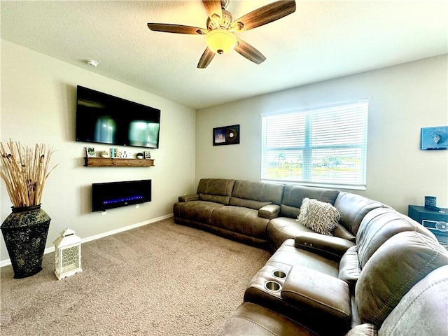 carpeted living room featuring ceiling fan