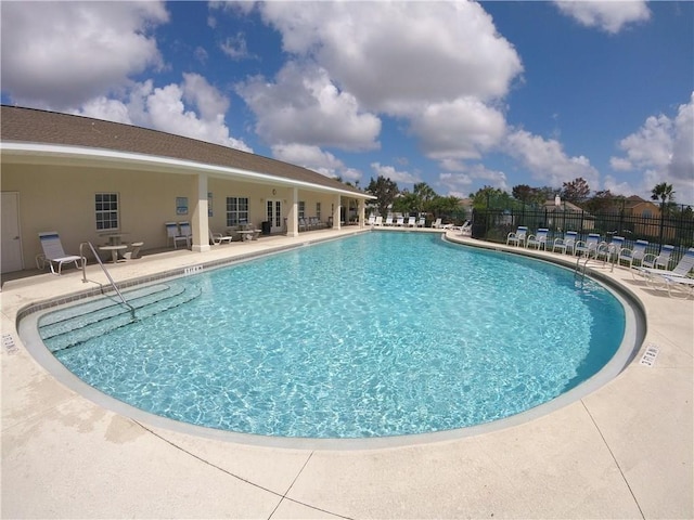 view of pool featuring a patio