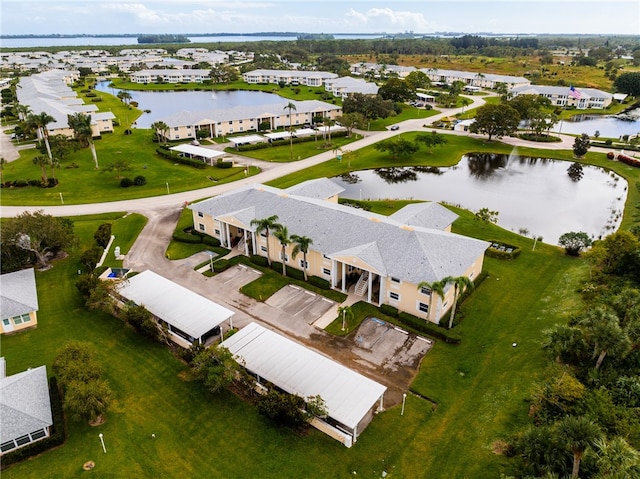 drone / aerial view with a water view