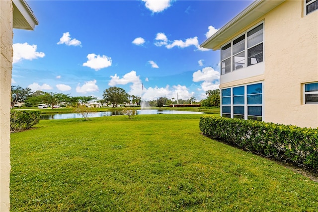 view of yard with a water view