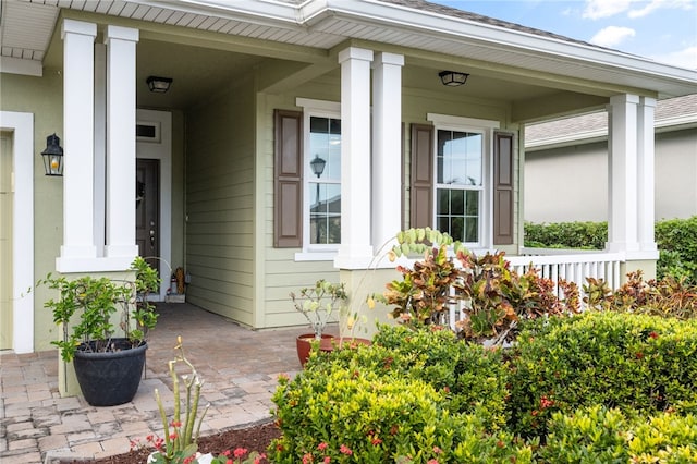 entrance to property with a porch