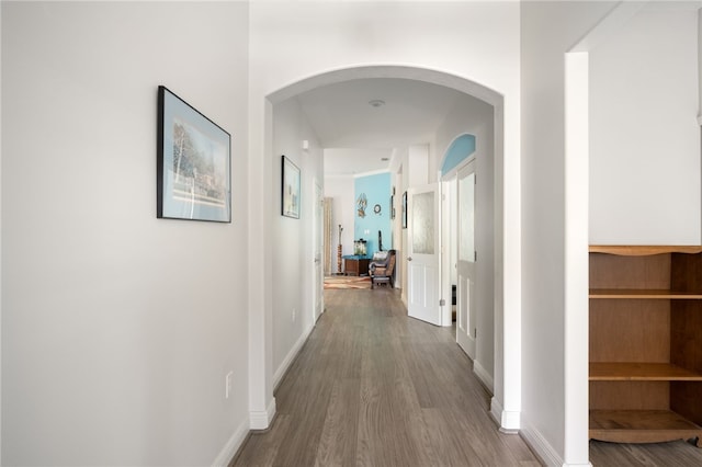 corridor featuring hardwood / wood-style floors