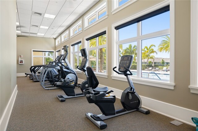 gym with a drop ceiling