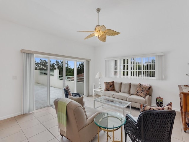 living room with light tile patterned floors and ceiling fan