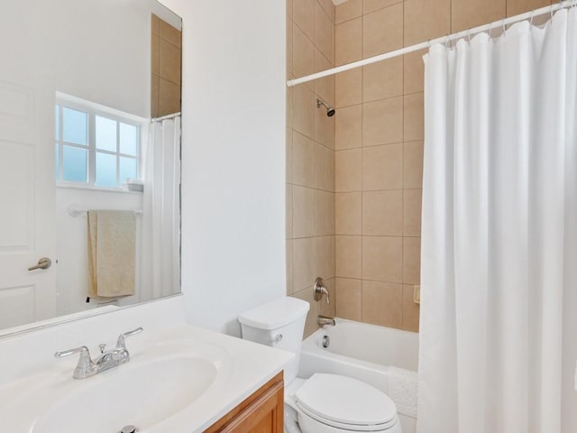 full bathroom featuring vanity, toilet, and shower / tub combo with curtain