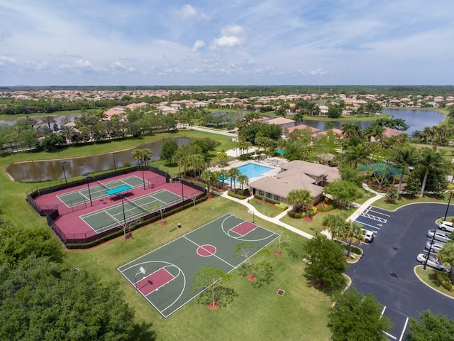 drone / aerial view with a water view