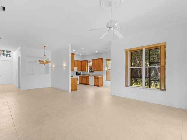 unfurnished living room with crown molding, light tile patterned flooring, and ceiling fan with notable chandelier