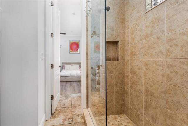 bathroom featuring tiled shower