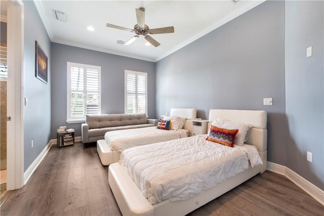 bedroom featuring dark hardwood / wood-style flooring, ceiling fan, and crown molding