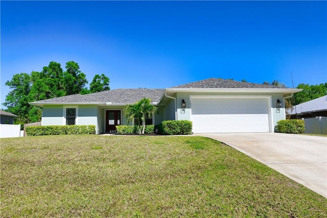 ranch-style house with stucco siding, a front yard, and fence