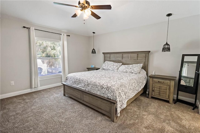 bedroom featuring carpet, baseboards, and ceiling fan
