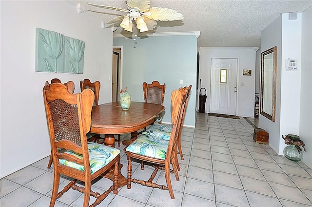 10320 92nd St, Vero Beach, FL 32967 - dining space featuring a textured ceiling, light tile patterned flooring, and ornamental molding