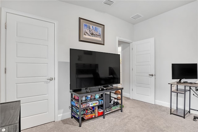 living room with light colored carpet