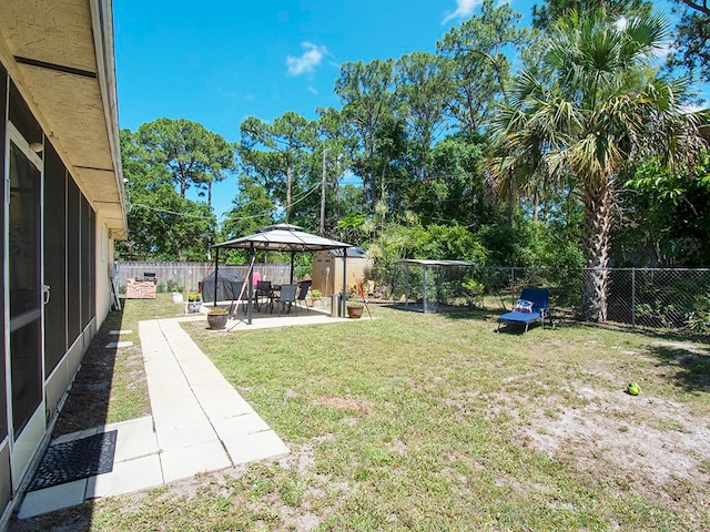 view of yard with a patio and a gazebo