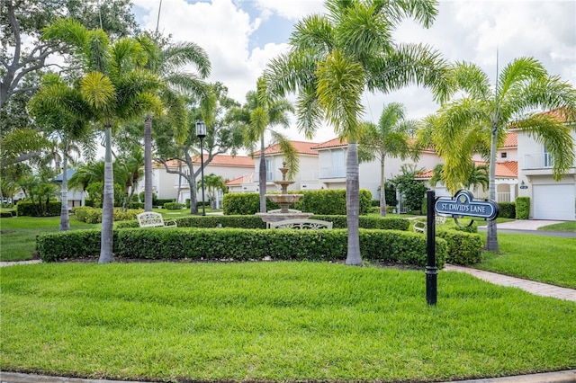 view of community featuring a lawn