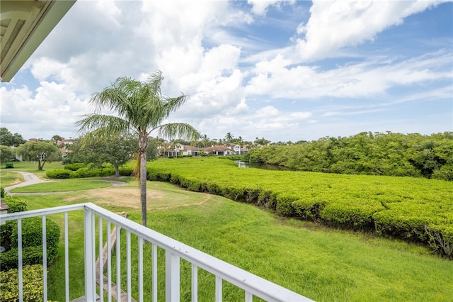 view of yard featuring a balcony