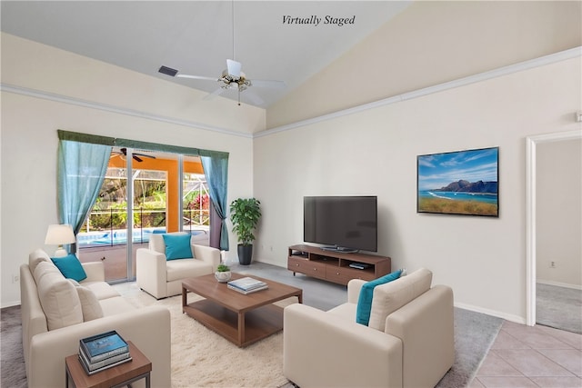 tiled living room featuring ceiling fan and high vaulted ceiling