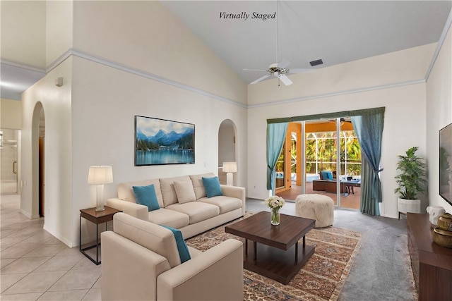 living room with high vaulted ceiling, light tile patterned floors, and ceiling fan