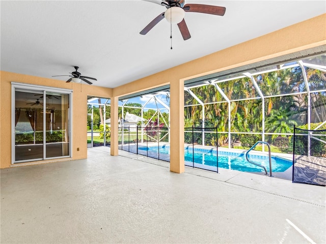 view of swimming pool featuring ceiling fan