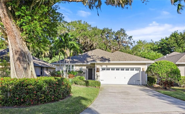 ranch-style home with a garage