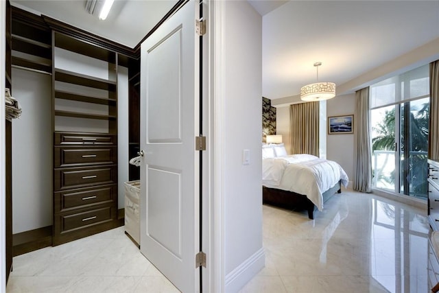 bedroom with light marble finish floors and baseboards