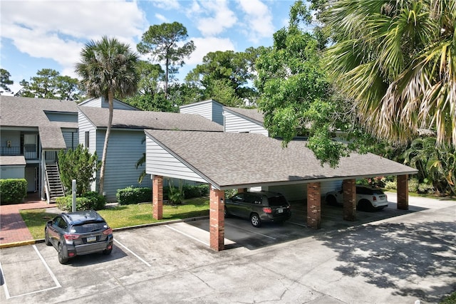 view of parking featuring a carport