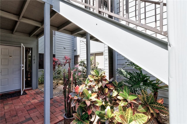 property entrance featuring a patio area