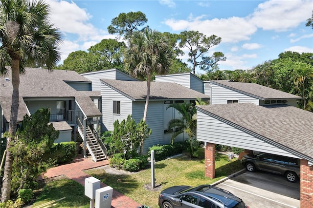 exterior space featuring a front lawn