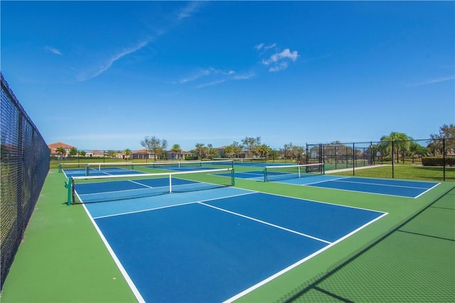 1712 Berkshire Cir SW, Vero Beach, FL 32968 - view of tennis court featuring community basketball court