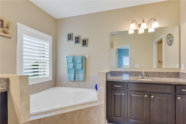1712 Berkshire Cir SW, Vero Beach, FL 32968 - bathroom with vanity and a garden tub
