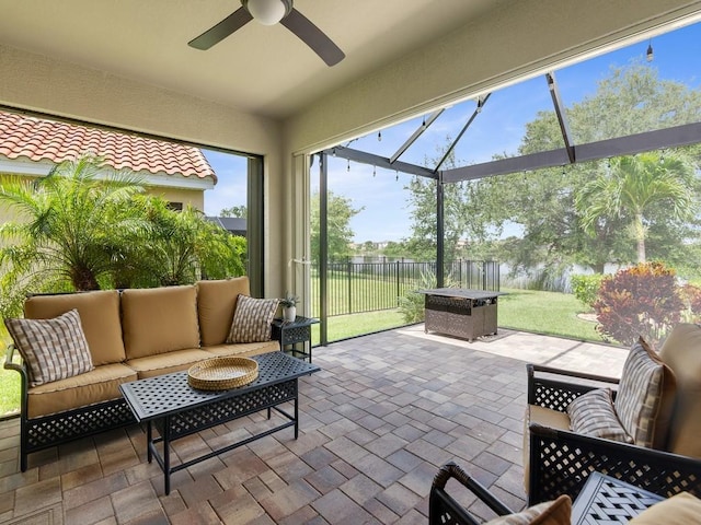 1712 Berkshire Cir SW, Vero Beach, FL 32968 - sunroom featuring a ceiling fan, outdoor lounge area, and a water view