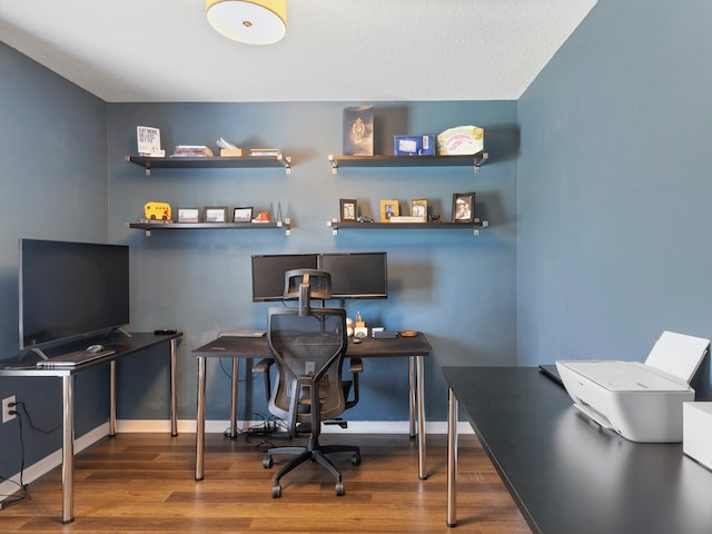 office space with hardwood / wood-style flooring