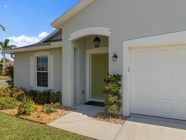 property entrance featuring a garage