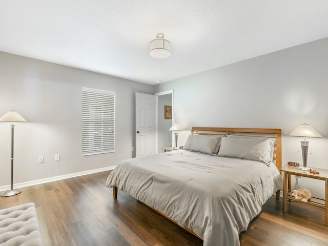 bedroom featuring hardwood / wood-style floors