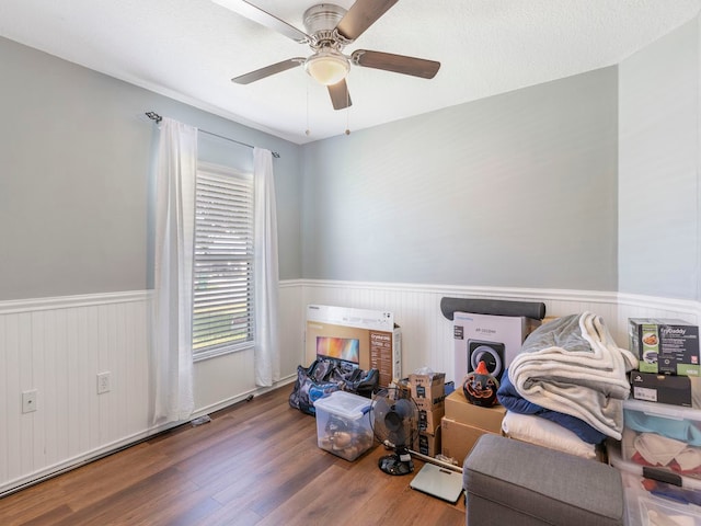 miscellaneous room featuring a textured ceiling, hardwood / wood-style flooring, and ceiling fan