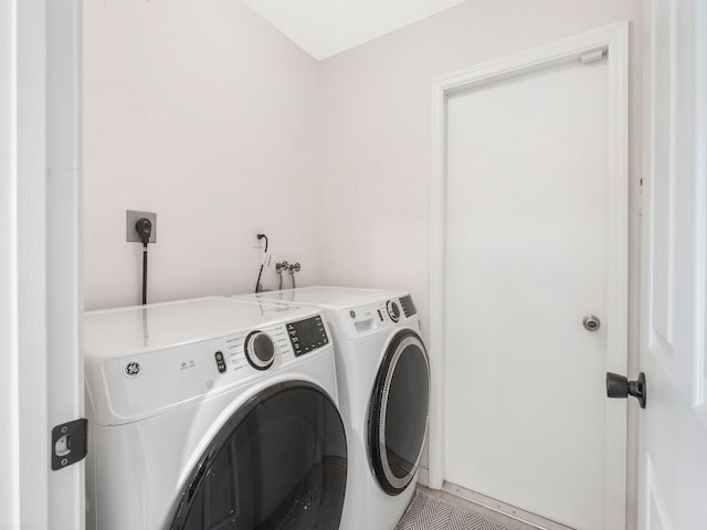 laundry area featuring independent washer and dryer