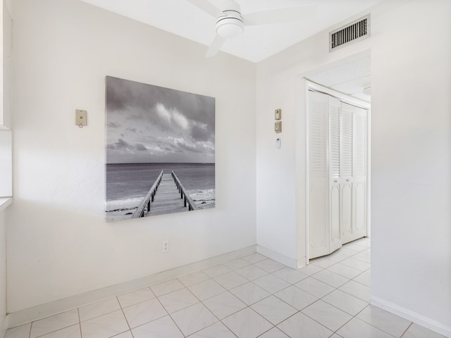 923 22nd Pl Unit 209, Vero Beach, FL 32960 - tiled empty room featuring ceiling fan