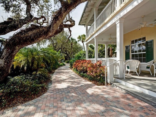 1440 Winding Oaks Cir W Unit A204, Vero Beach, FL 32963 - porch featuring a ceiling fan