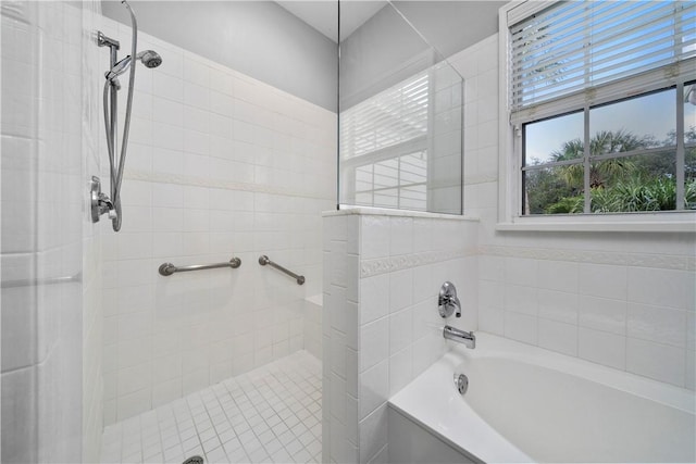 1440 Winding Oaks Cir W Unit A204, Vero Beach, FL 32963 - full bathroom featuring tiled shower and a garden tub