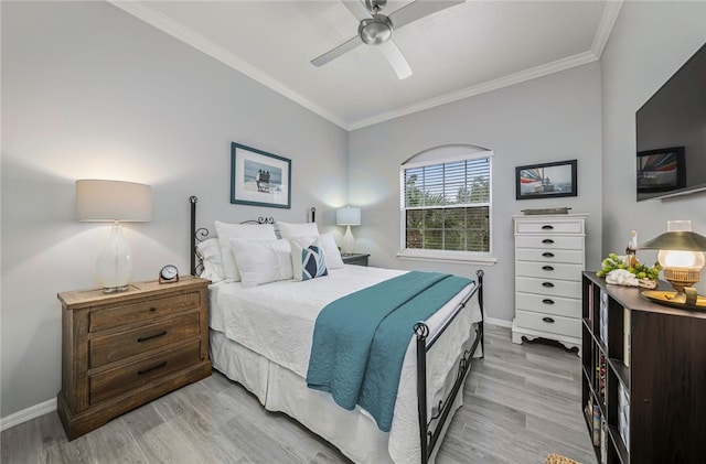 1440 Winding Oaks Cir W Unit A204, Vero Beach, FL 32963 - bedroom featuring ornamental molding, light wood finished floors, and ceiling fan