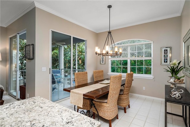 dining space with an inviting chandelier, light tile patterned floors, baseboards, and ornamental molding