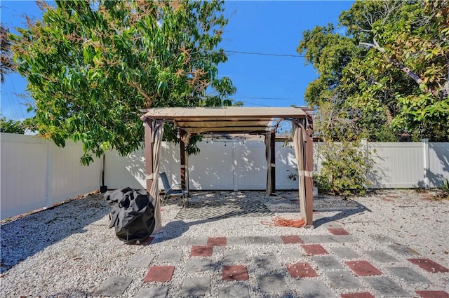 view of patio with a carport