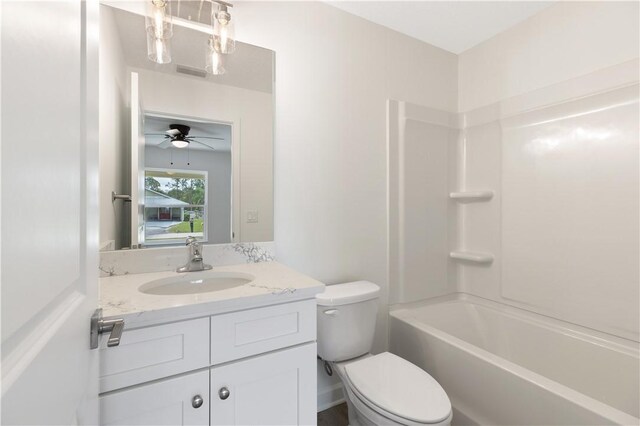 full bathroom featuring shower / bathing tub combination, vanity, toilet, and ceiling fan