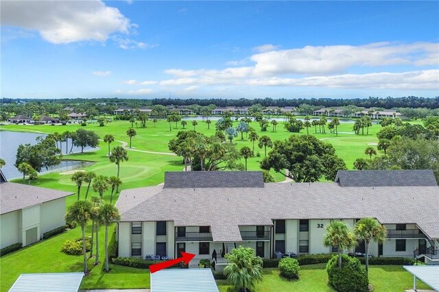 32 Plantation Dr Unit 102, Vero Beach, FL 32966 - bird's eye view of a golf club and a large body of water